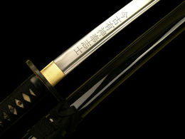 Student kills burglar with samurai sword