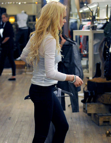 Lindsay Lohan Looks Like A Classy Streetwalker