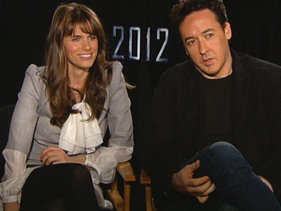 ‘2012′ Stars John Cusack, Amanda Peet Talk Adam Lambert’s ‘Miracles’
