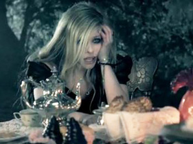 Avril Lavigne Falls Through The Rabbit Hole For ‘Alice’ Video